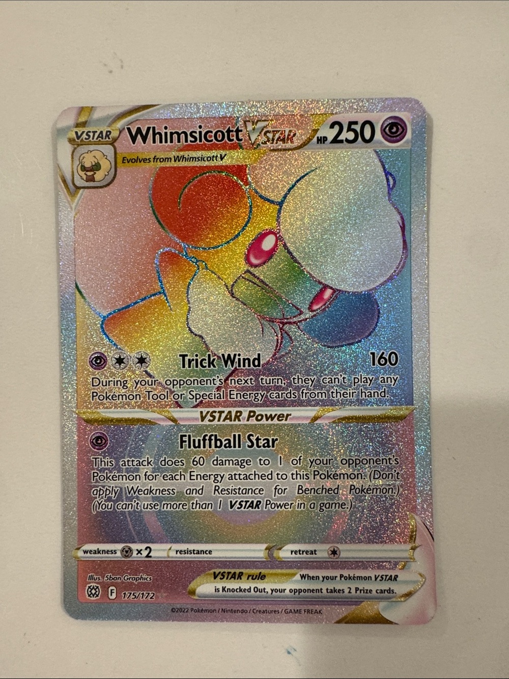Pokemon Whimsicott VSTAR Rainbow Holofoil Card - pink, blue, green, yellow